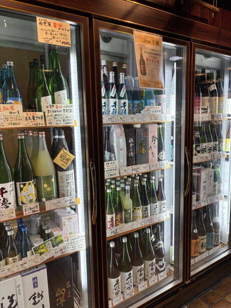Refrigerated sake section inside Osakaya, a liquor store in Miyazaki City