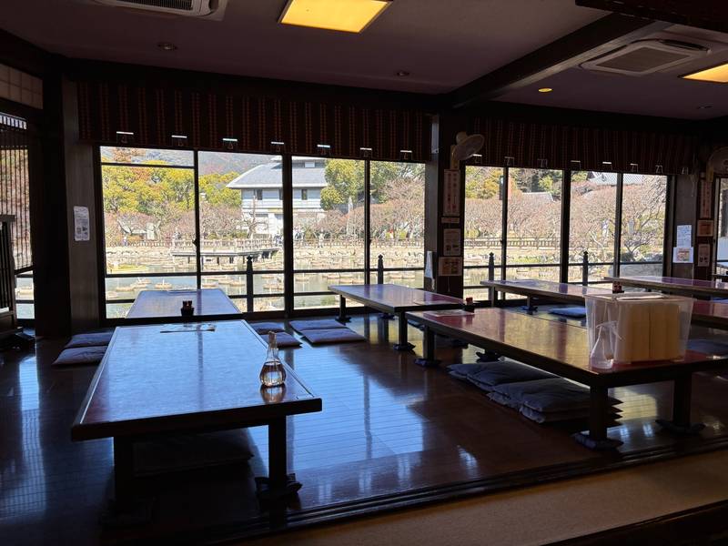 Interior of "UguisuCyaya"featuring traditional Japanese decor.