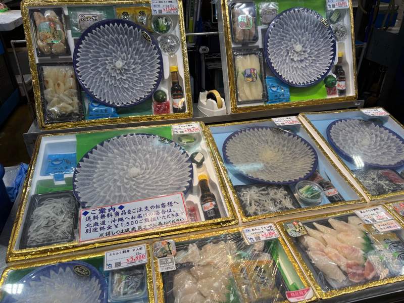 High-end torafugu sashimi platters displayed at Karato Market