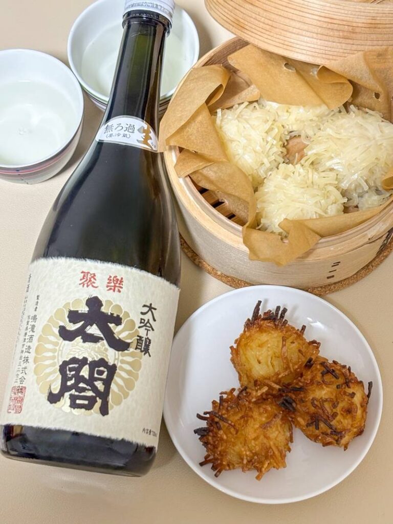 Table setting with Manbo squid shumai and Juraku Taiko sake